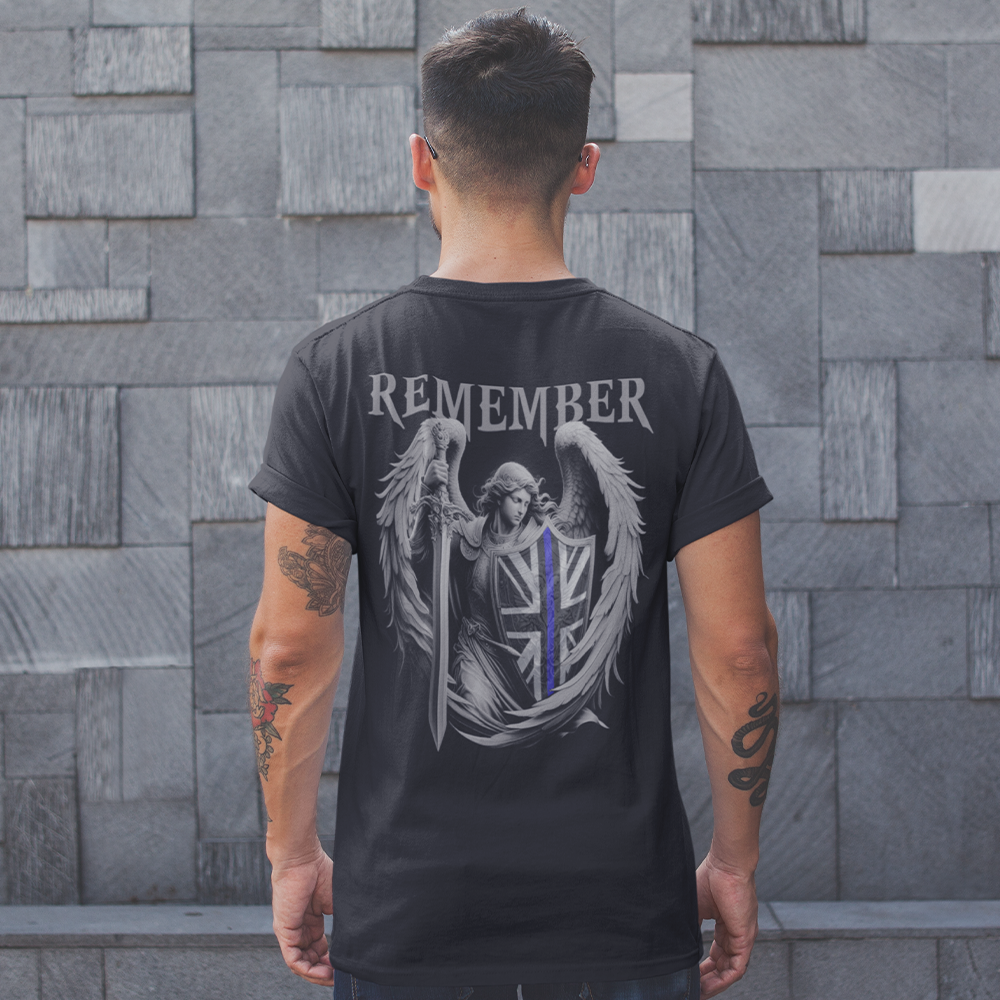 back view of man wearing black cotton short sleeve original t-shirt with remember thin blue line design across back