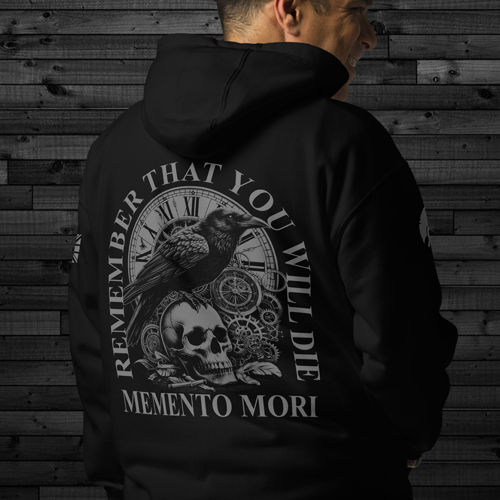 Close up of back of man wearing back view of Black unisex fit Pullover Hoodie by Achilles Tactical Clothing Brand printed with Large Memento Mori design across back