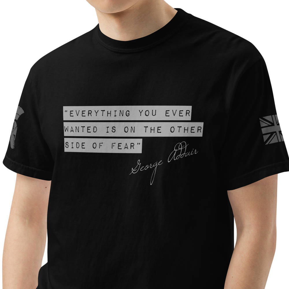 Front view of man wearing black short sleeve unisex fit classic T-shirt by Achilles Tactical Clothing Brand with the other side of fear quote printed across chest.